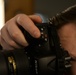 Staff Sgt. James Miller gets ready to take an official photo