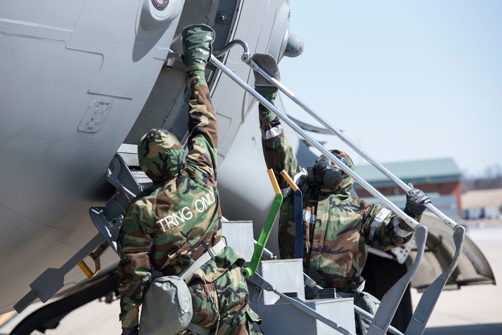 Maintainers and aircrew practice decon procedures