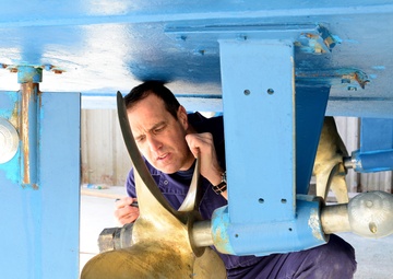 Coast Guard marine inspector inspects small passenger vessels