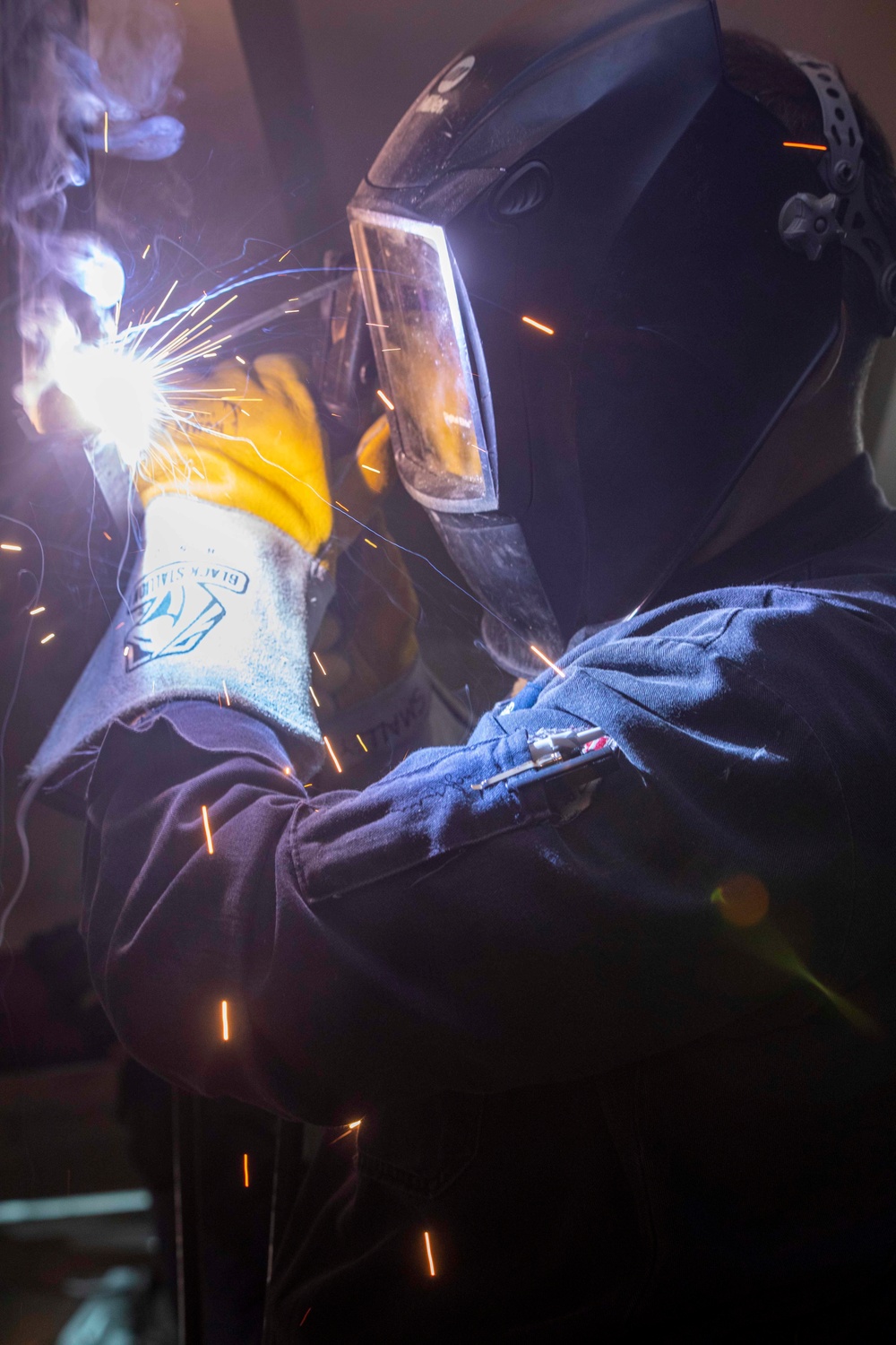 Sailors make repairsaboard New York