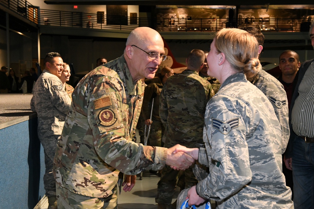 Gen. Arnold W. Bunch greets airman and civilians after Commander's Call