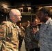 Gen. Arnold W. Bunch greets airman and civilians after Commander's Call