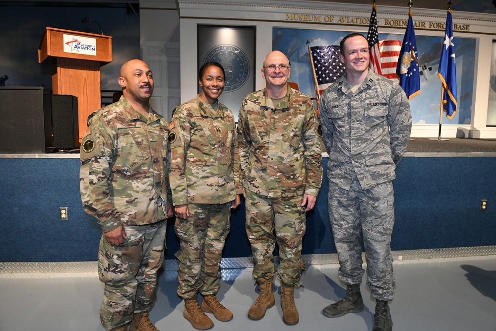 Gen. Arnold W. Bunch greets airman and civilians after Commander's Call