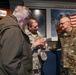 Gen. Arnold W. Bunch greets airman and civilians after Commander's Call