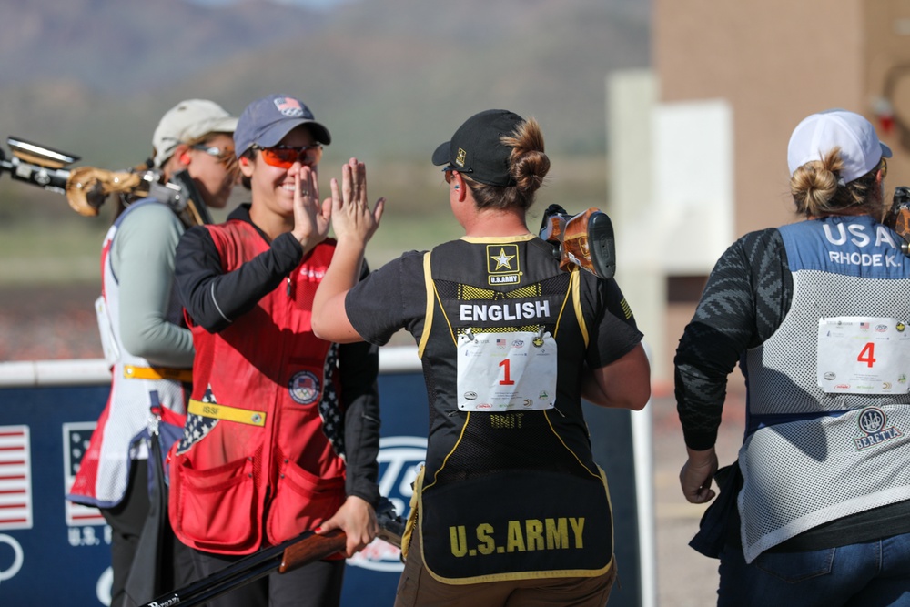World Champion high fives an Olympian and Soldier