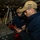 Nimitz Sailors Use Pliers During Aircraft Jack Maintenance
