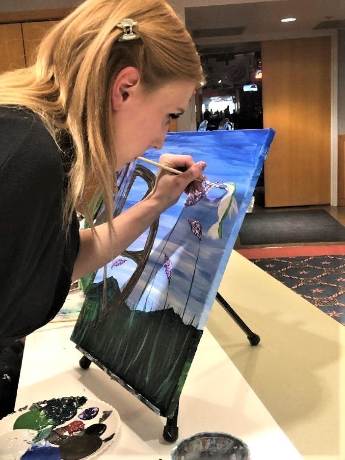 Fort McCoy community members create works of art at Sit, Sip, Paint event