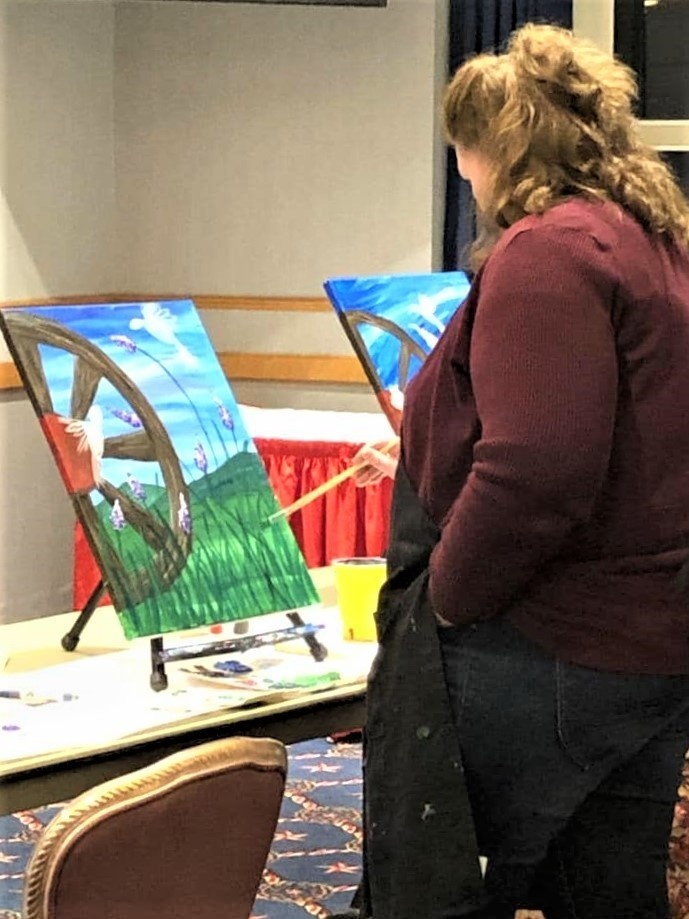 Fort McCoy community members create works of art at Sit, Sip, Paint event