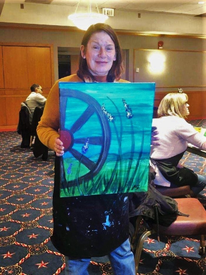 Fort McCoy community members create works of art at Sit, Sip, Paint event