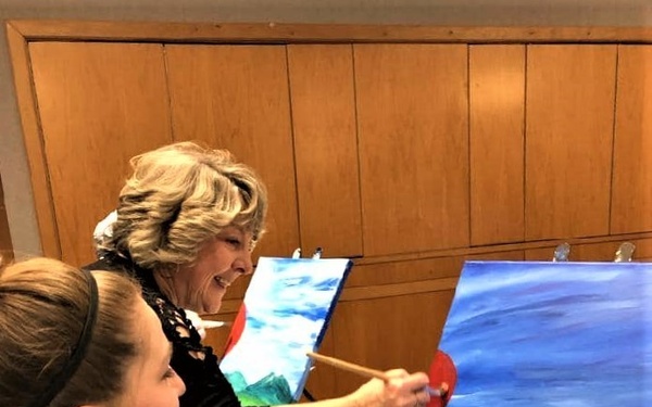 Fort McCoy community members create works of art at Sit, Sip, Paint event