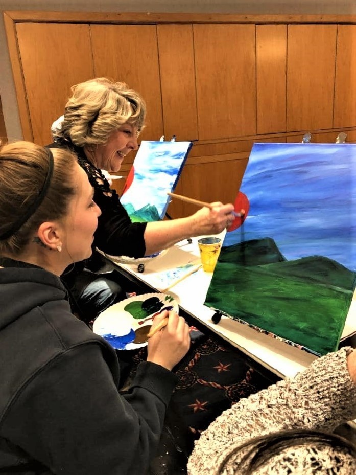 Fort McCoy community members create works of art at Sit, Sip, Paint event