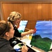 Fort McCoy community members create works of art at Sit, Sip, Paint event