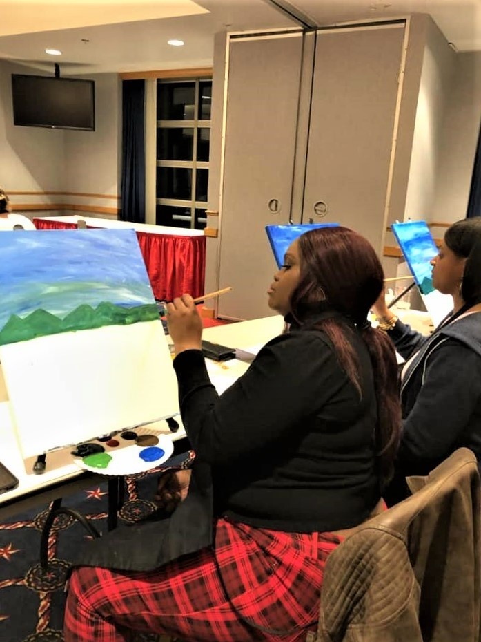 Fort McCoy community members create works of art at Sit, Sip, Paint event
