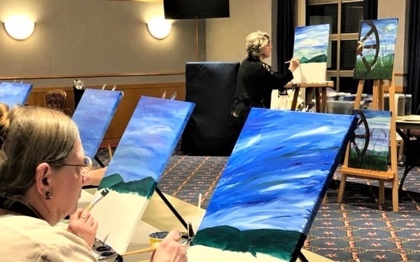 Fort McCoy community members create works of art at Sit, Sip, Paint event