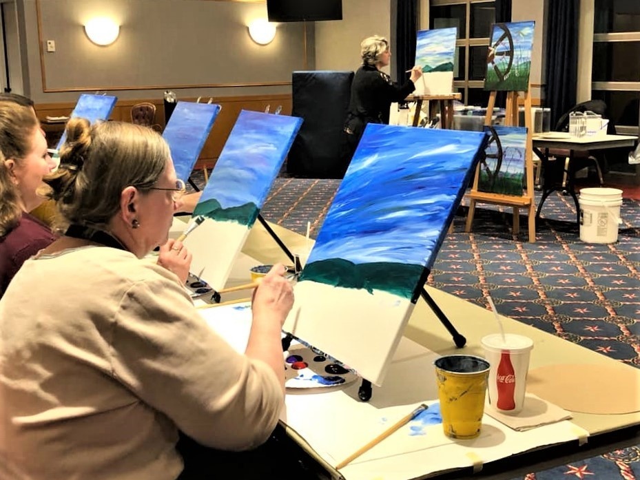 Fort McCoy community members create works of art at Sit, Sip, Paint event
