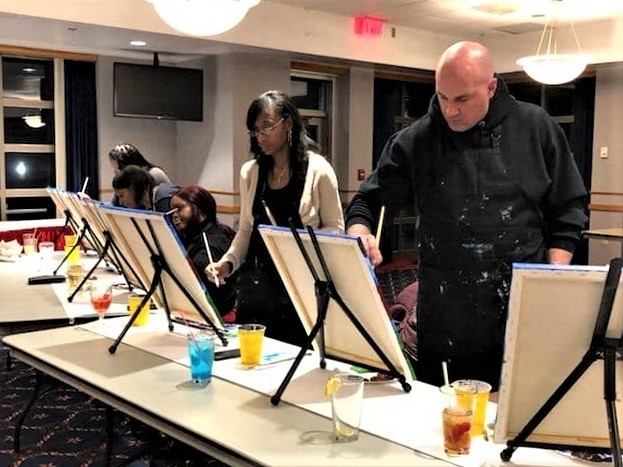 Fort McCoy community members create works of art at Sit, Sip, Paint event