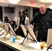 Fort McCoy community members create works of art at Sit, Sip, Paint event