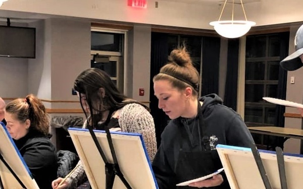 Fort McCoy community members create works of art at Sit, Sip, Paint event