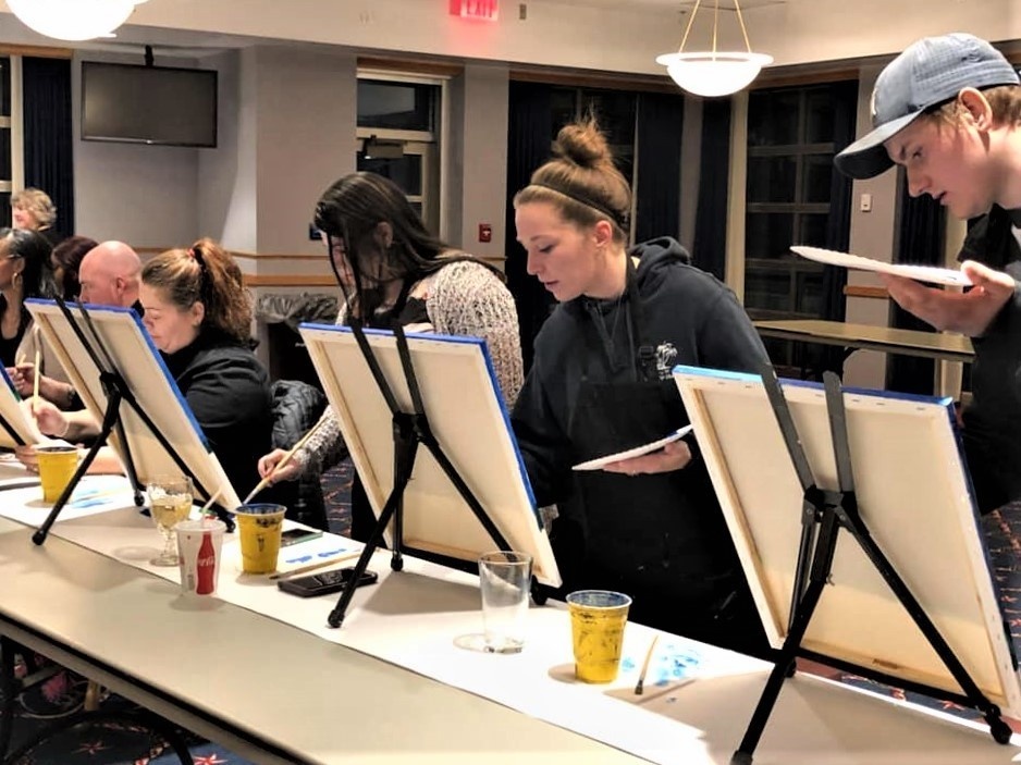 Fort McCoy community members create works of art at Sit, Sip, Paint event