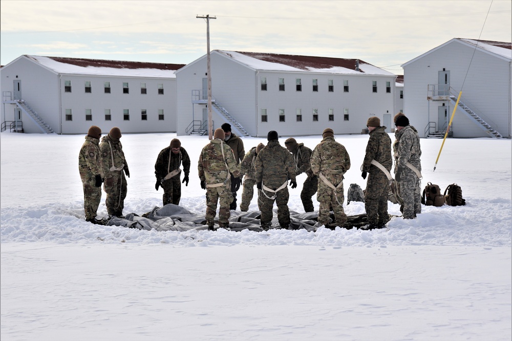 CWOC Class 20-04 students learn to build Arctic tent during training at Fort McCoy