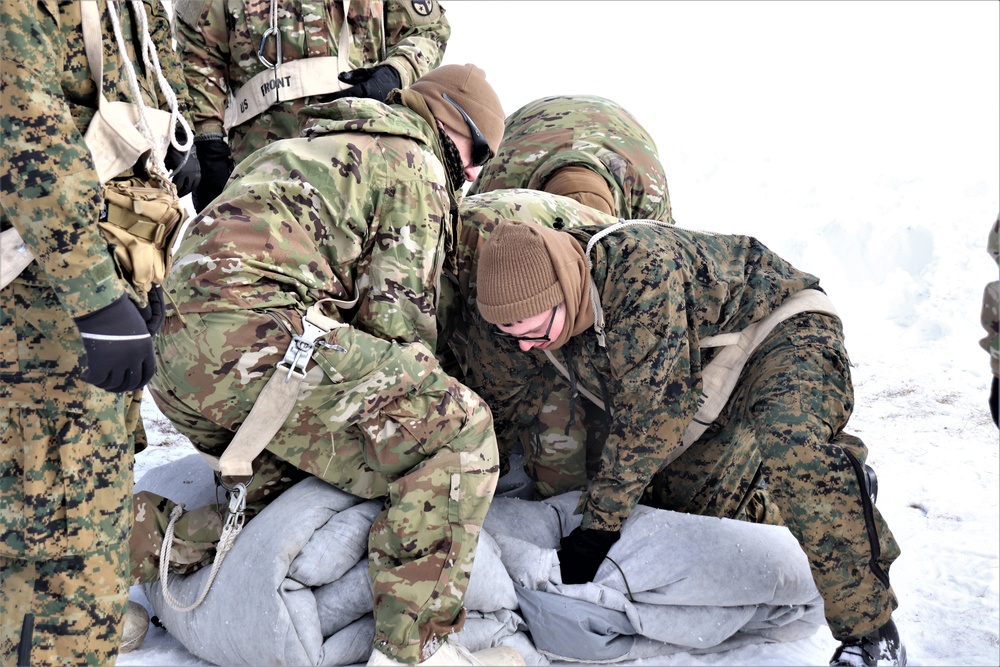 CWOC Class 20-04 students learn to build Arctic tent during training at Fort McCoy