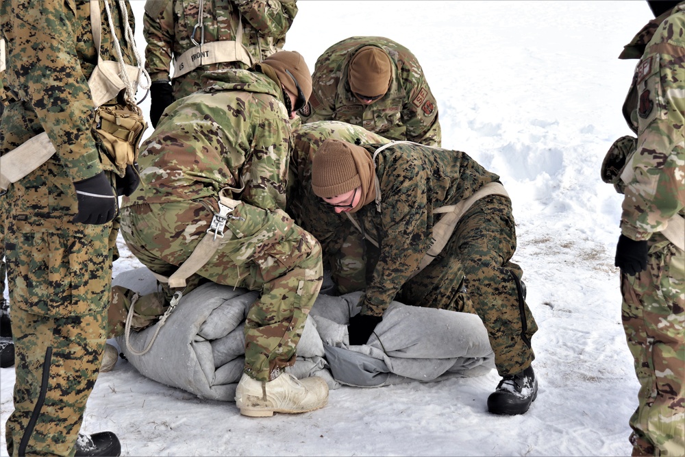 CWOC Class 20-04 students learn to build Arctic tent during training at Fort McCoy