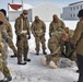 CWOC Class 20-04 students learn to build Arctic tent during training at Fort McCoy