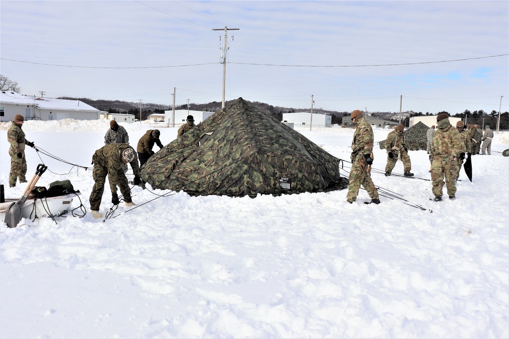 CWOC Class 20-04 students learn to build Arctic tent during training at Fort McCoy