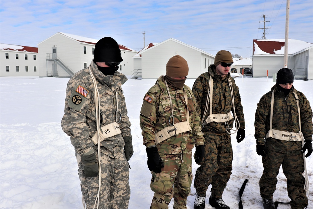 CWOC Class 20-04 students learn to build Arctic tent during training at Fort McCoy