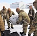 CWOC Class 20-04 students learn to build Arctic tent during training at Fort McCoy