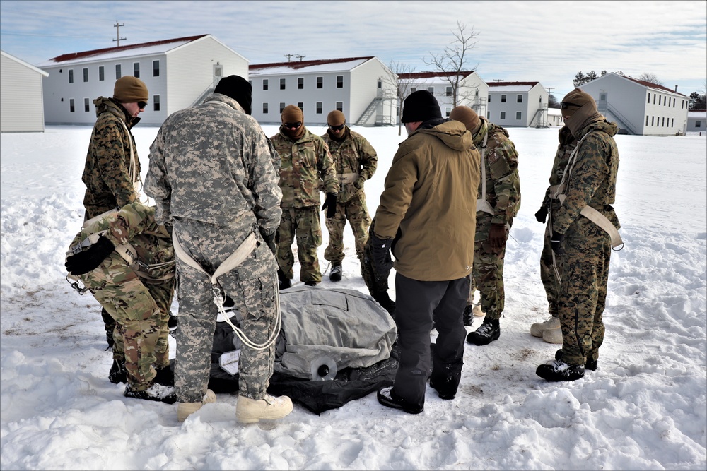 CWOC Class 20-04 students learn to build Arctic tent during training at Fort McCoy