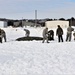 CWOC Class 20-04 students learn to build Arctic tent during training at Fort McCoy