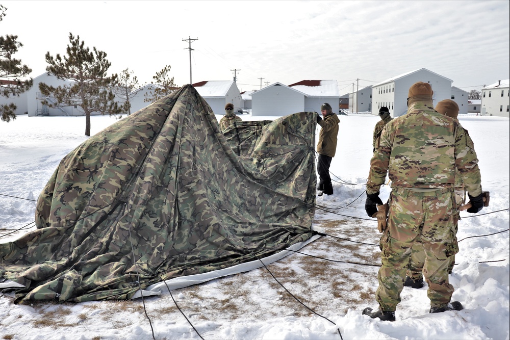 CWOC Class 20-04 students learn to build Arctic tent during training at Fort McCoy