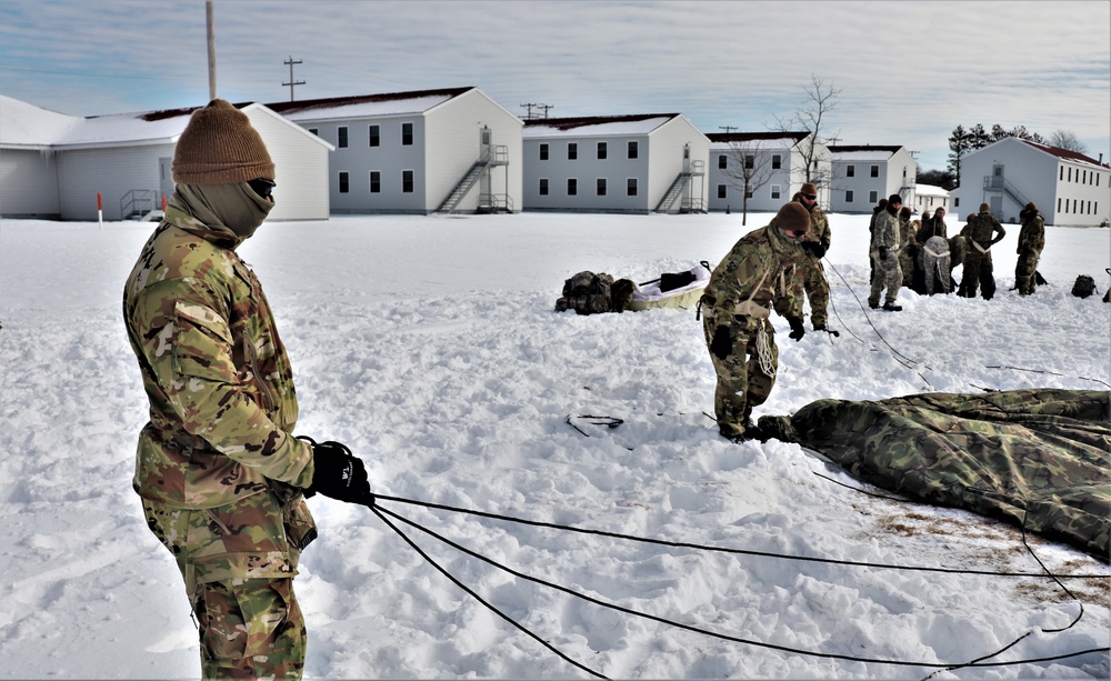 CWOC Class 20-04 students learn to build Arctic tent during training at Fort McCoy