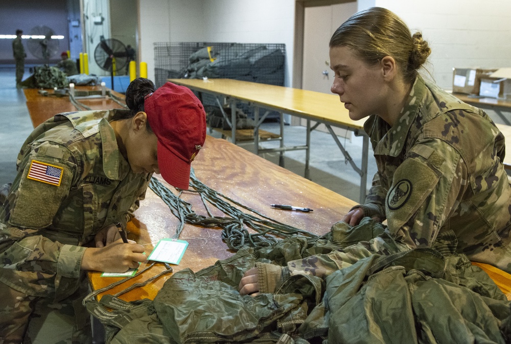U.S. Army Reserve Soldiers ready platforms and parachutes for upcoming exercise.