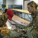 U.S. Army Reserve Soldiers ready platforms and parachutes for upcoming exercise.