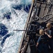 USS Mustin Sailors Man .50-Caliber Machine Gun