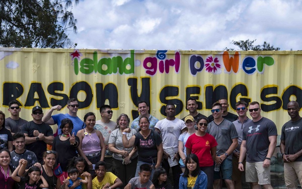 U.S. Marines and Sailors volunteer with Island Girl Power