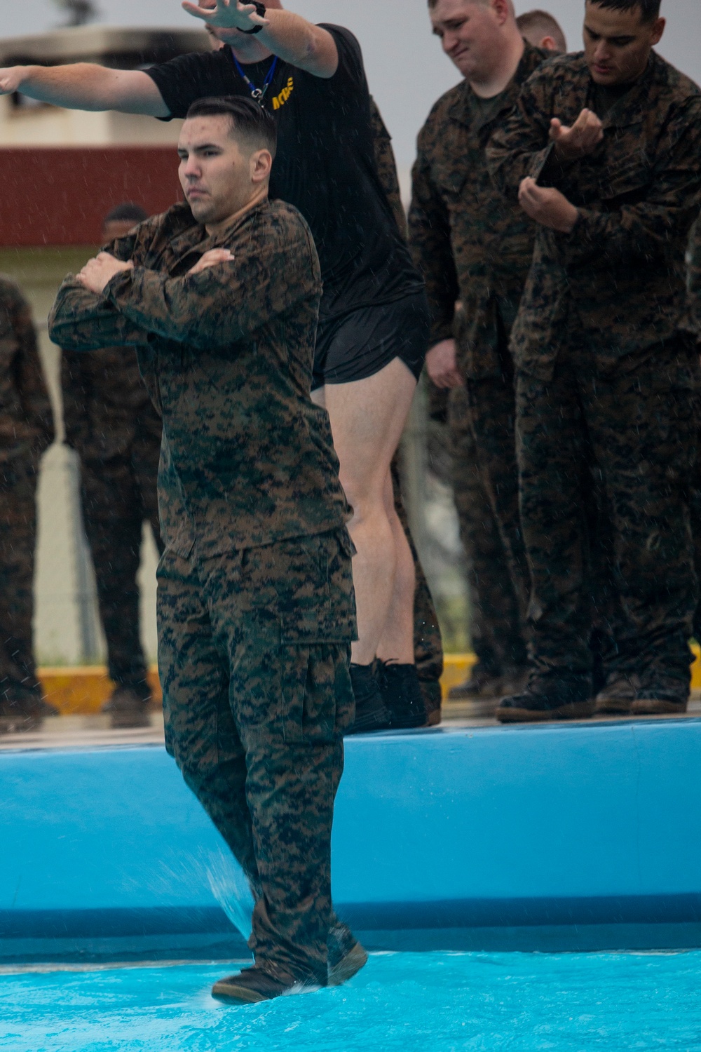 U.S. Marines and sailors with MCIPAC complete annual swim qualification