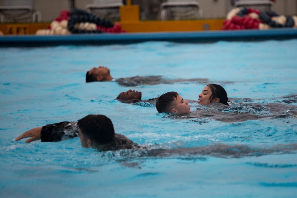 U.S. Marines and sailors with MCIPAC complete annual swim qualification