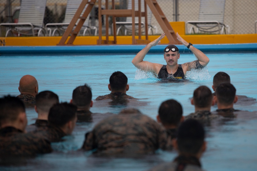 U.S. Marines and sailors with MCIPAC complete annual swim qualification
