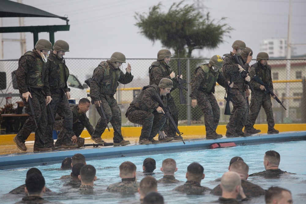 U.S. Marines and sailors with MCIPAC complete annual swim qualification