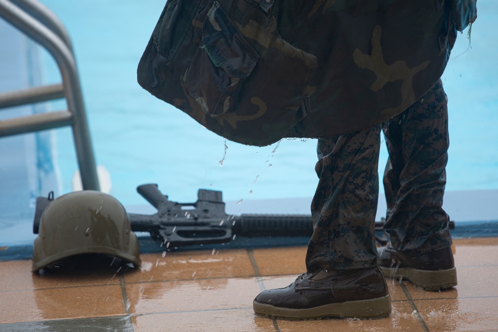 U.S. Marines and sailors with MCIPAC complete annual swim qualification