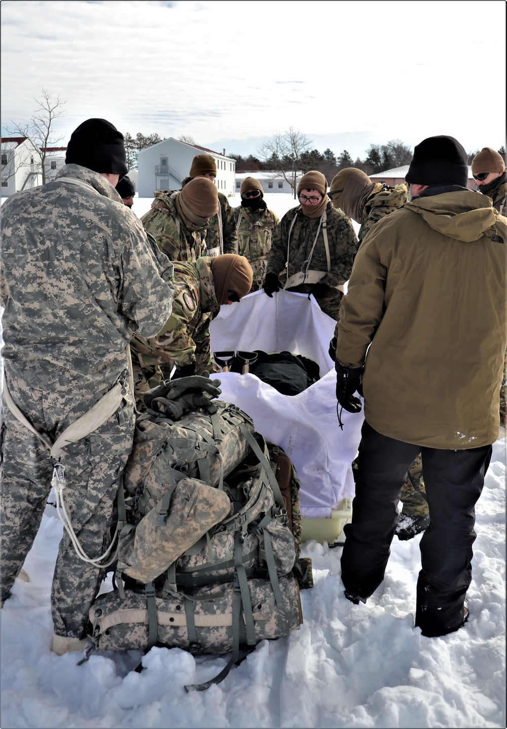 CWOC Class 20-04 students learn to build Arctic tent during training at Fort McCoy