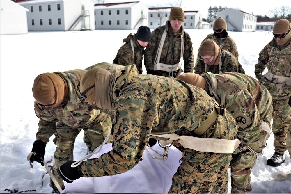 CWOC Class 20-04 students learn to build Arctic tent during training at Fort McCoy