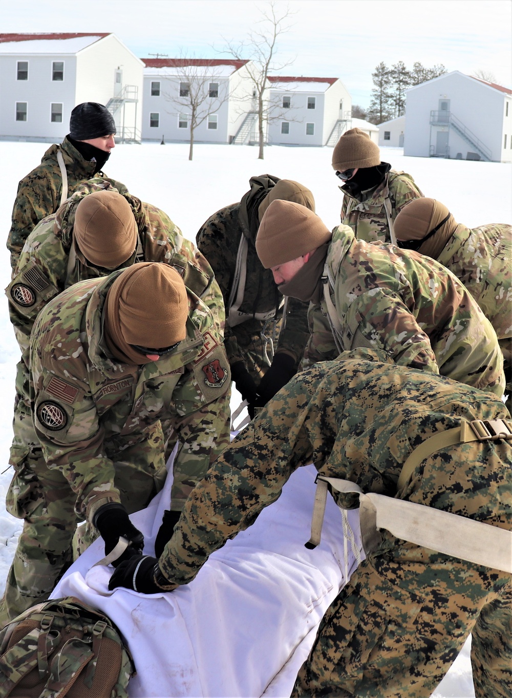 CWOC Class 20-04 students learn to build Arctic tent during training at Fort McCoy