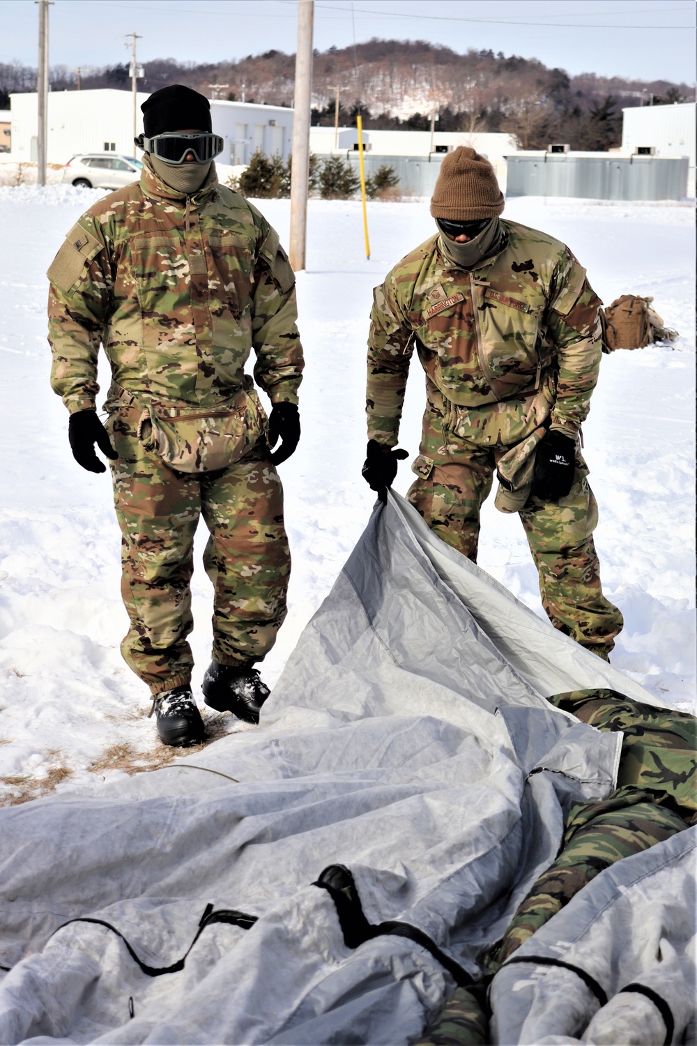 CWOC Class 20-04 students learn to build Arctic tent during training at Fort McCoy