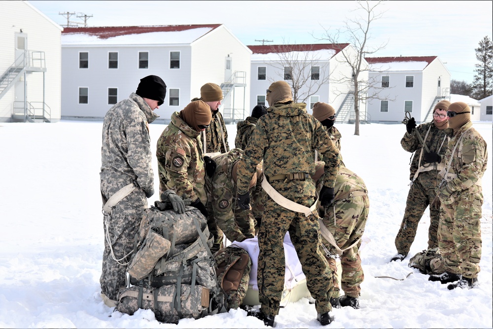 CWOC Class 20-04 students learn to build Arctic tent during training at Fort McCoy