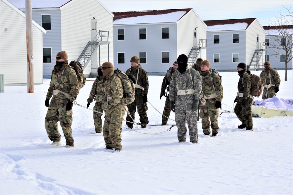 Fort McCoy CWOC Class 20-04 students practice pulling ahkio sled as a squad