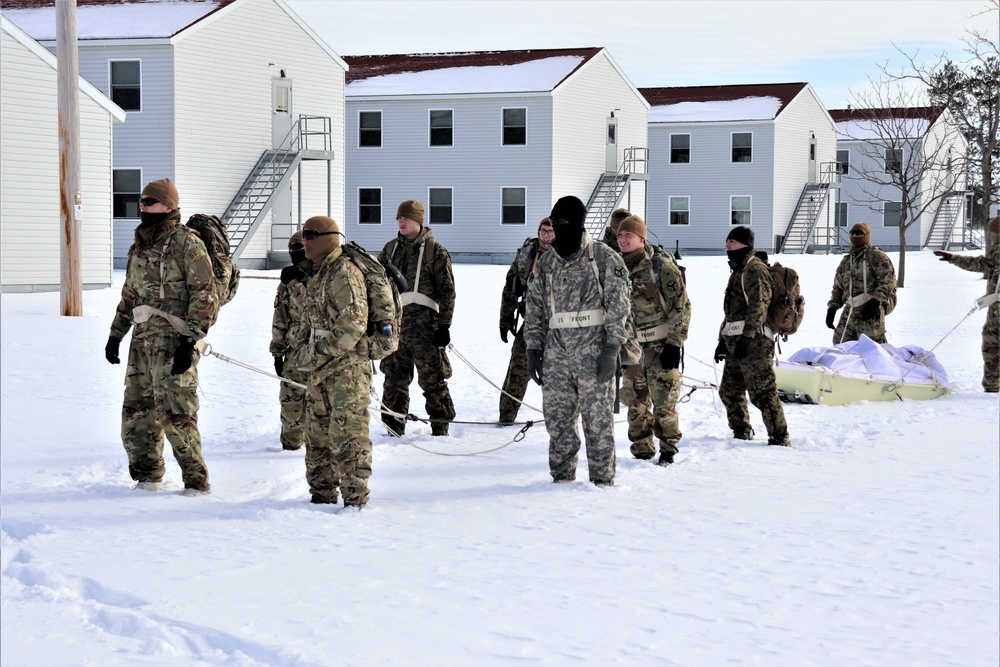 Fort McCoy CWOC Class 20-04 students practice pulling ahkio sled as a squad